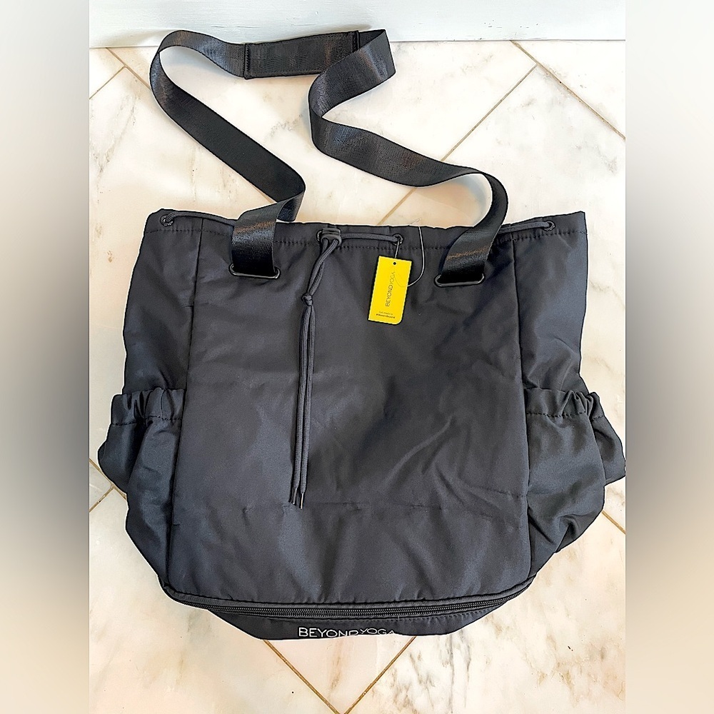 New! Beyond Yoga convertible black backpack or shoulder bag w/shoe compartment
